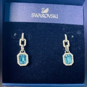 Swarovski drop earrings, blue crystal, rhodium plated. Like new, w/ box.